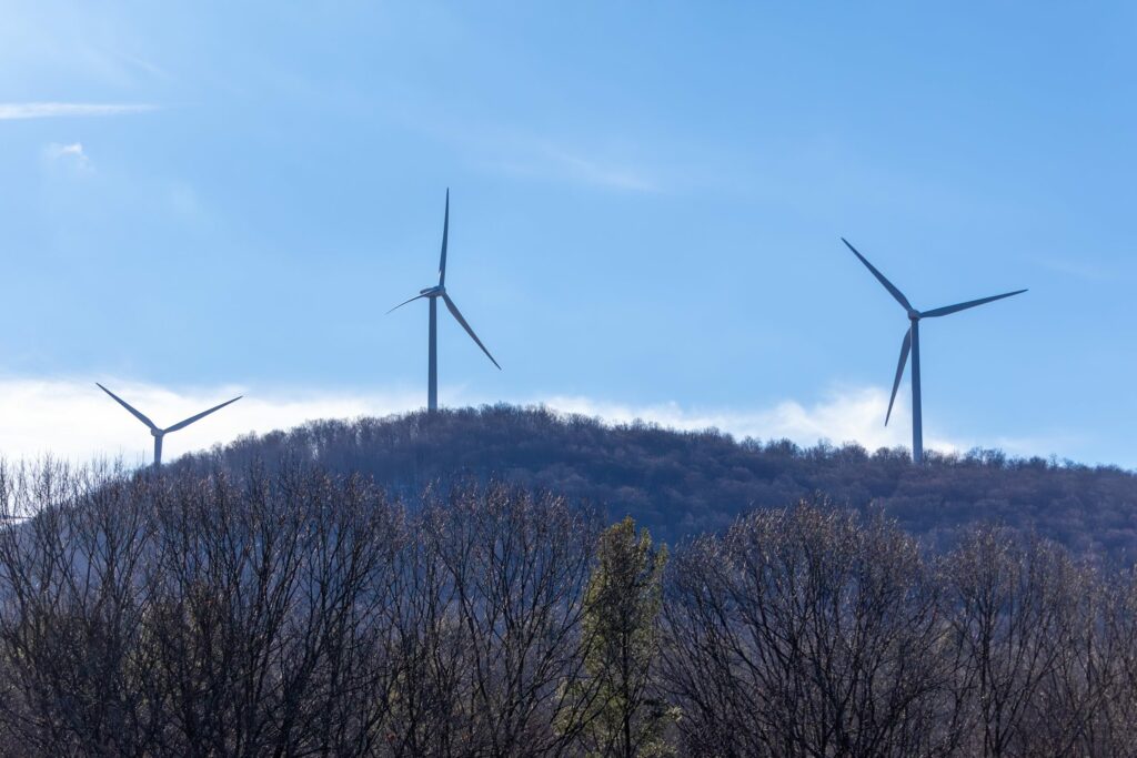 Photograph of wind turbines in Fairfax, VT taken by Emma Rippe in 2023.