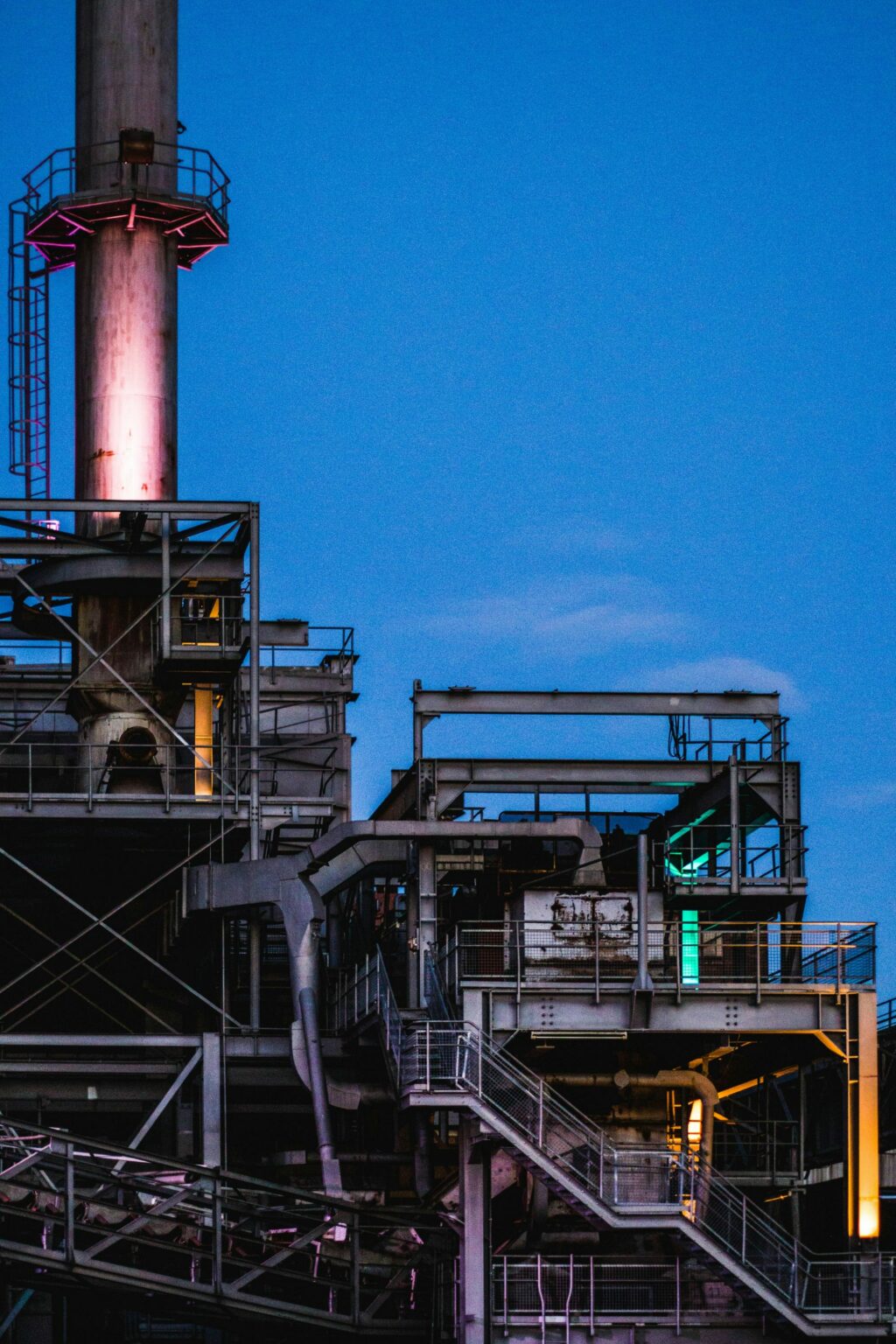 Image of the exterior of a steel plant taken in Völklingen, Germany by Adrienguh via Unsplash.