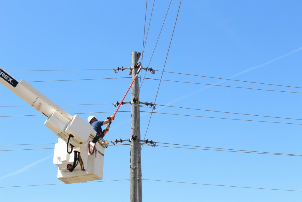 Public power lineworker by American Public Power Association via Unsplash