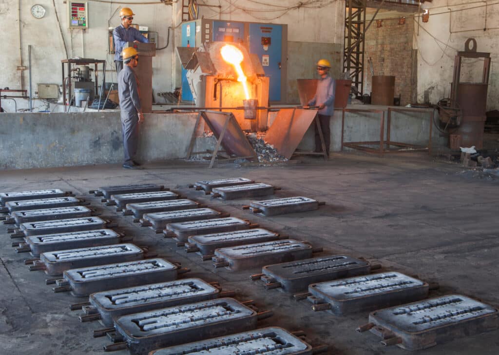 Workers in a casting factory near Ludhiana, Punjab, India, Shutterstock ID#1051991330