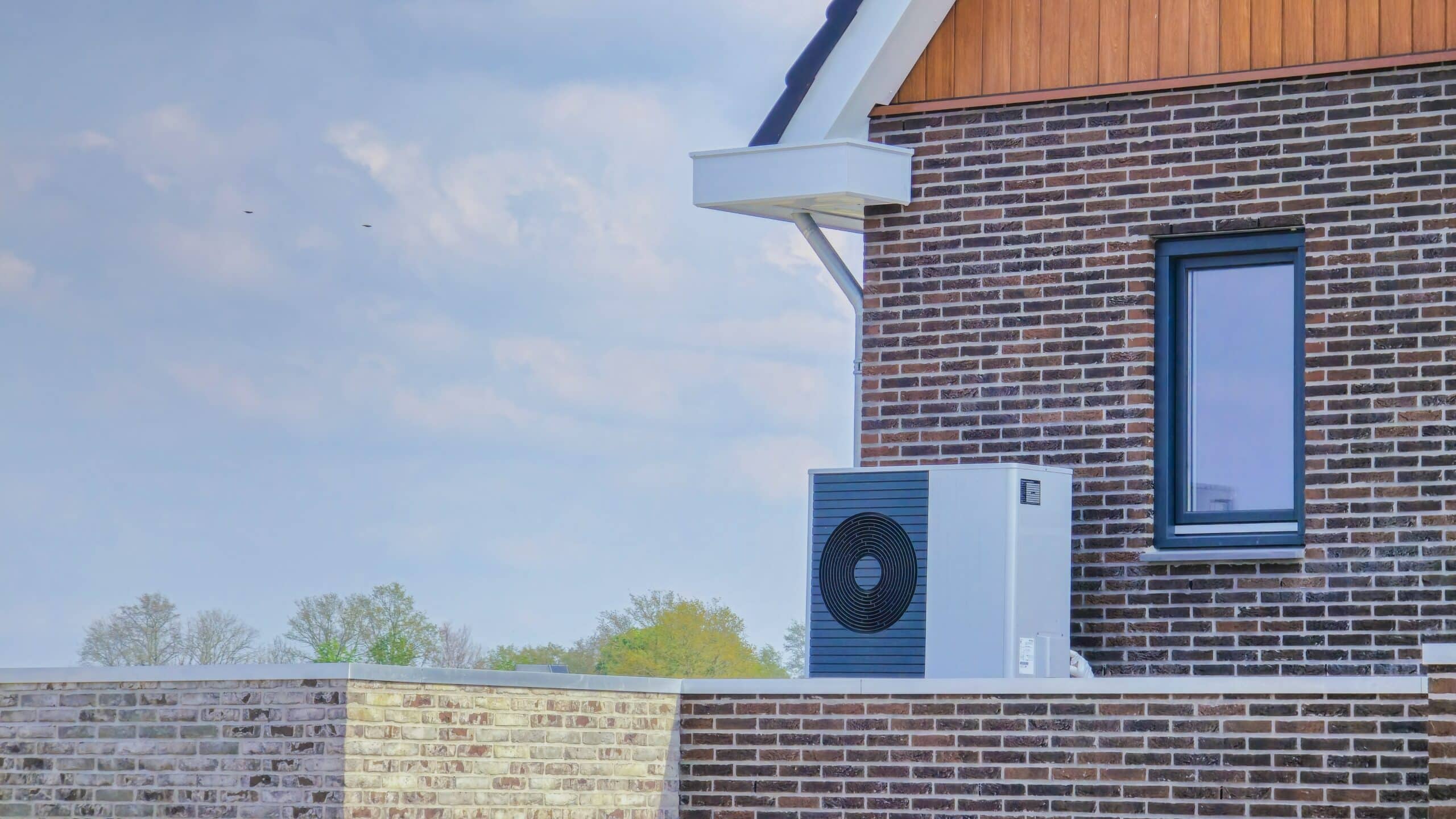 Heat pump on the side of a home in the Netherlands, Shutterstock ID#2449564373