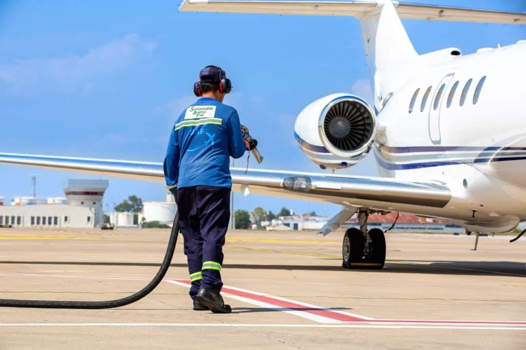 The technician refueling private jet with sustainable aviation fuel, Shutterstock ID#2510038871